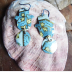 Hamsa dangle earrings from recycled tea tin with niobium ear wire