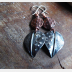 Mixed metal fold form dangle leaf earrings