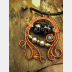 Mixed metal wire woven lampwork organic swirling pendant