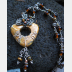 Brown jasper swirling pendant with a sterling and tigereye beaded chain
