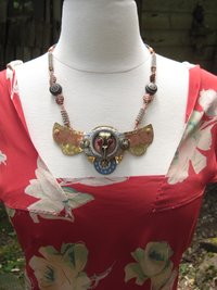 Steampunk  statement  repurposed breastplate winged watch parts