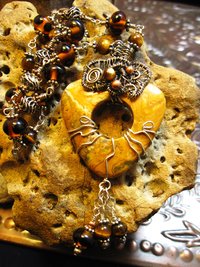 Brown jasper swirling pendant with a sterling and tigereye beaded chain