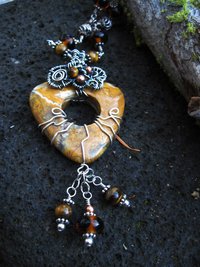Brown jasper swirling pendant with a sterling and tigereye beaded chain