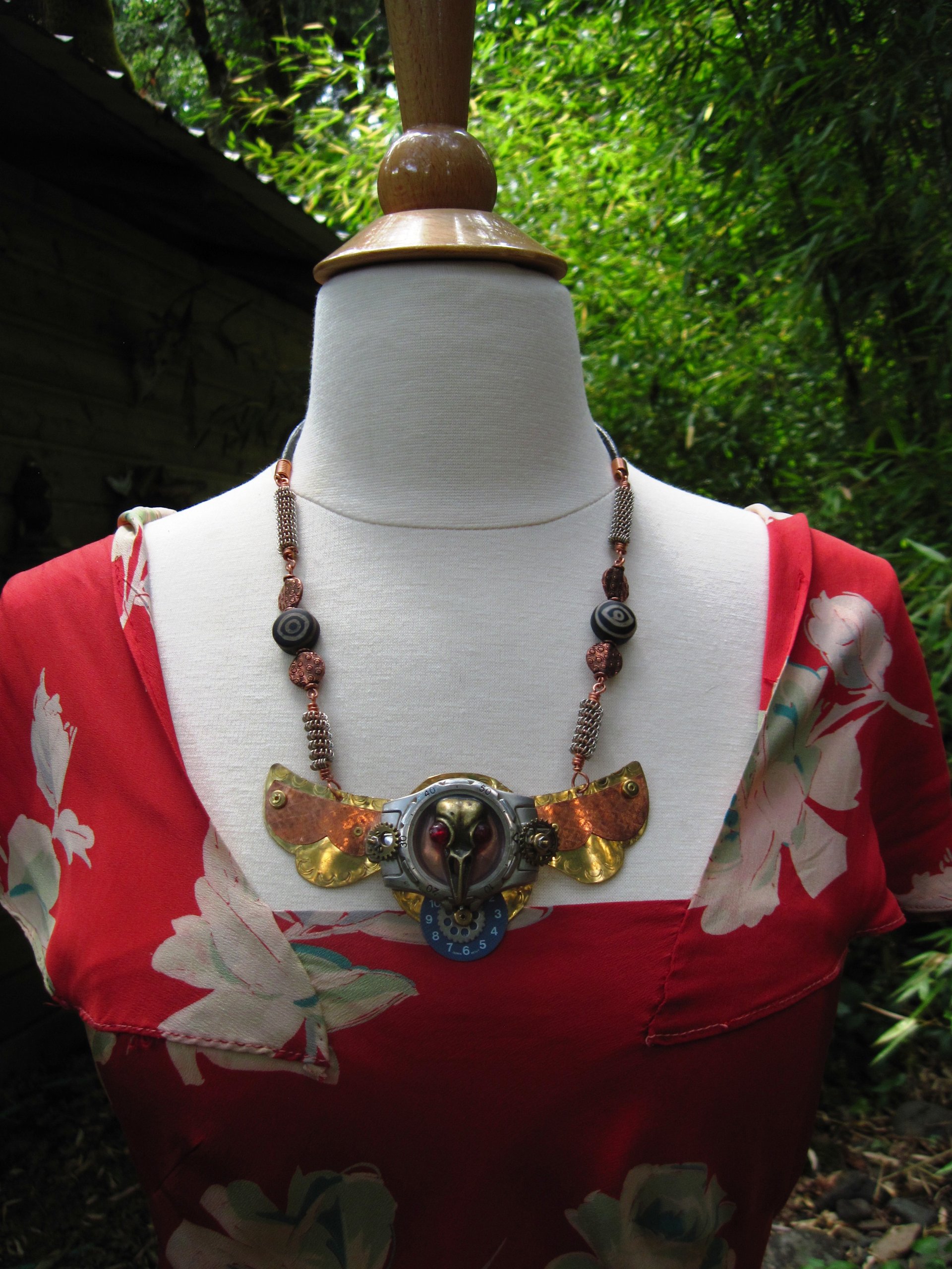 Steampunk  statement  repurposed breastplate winged watch parts
