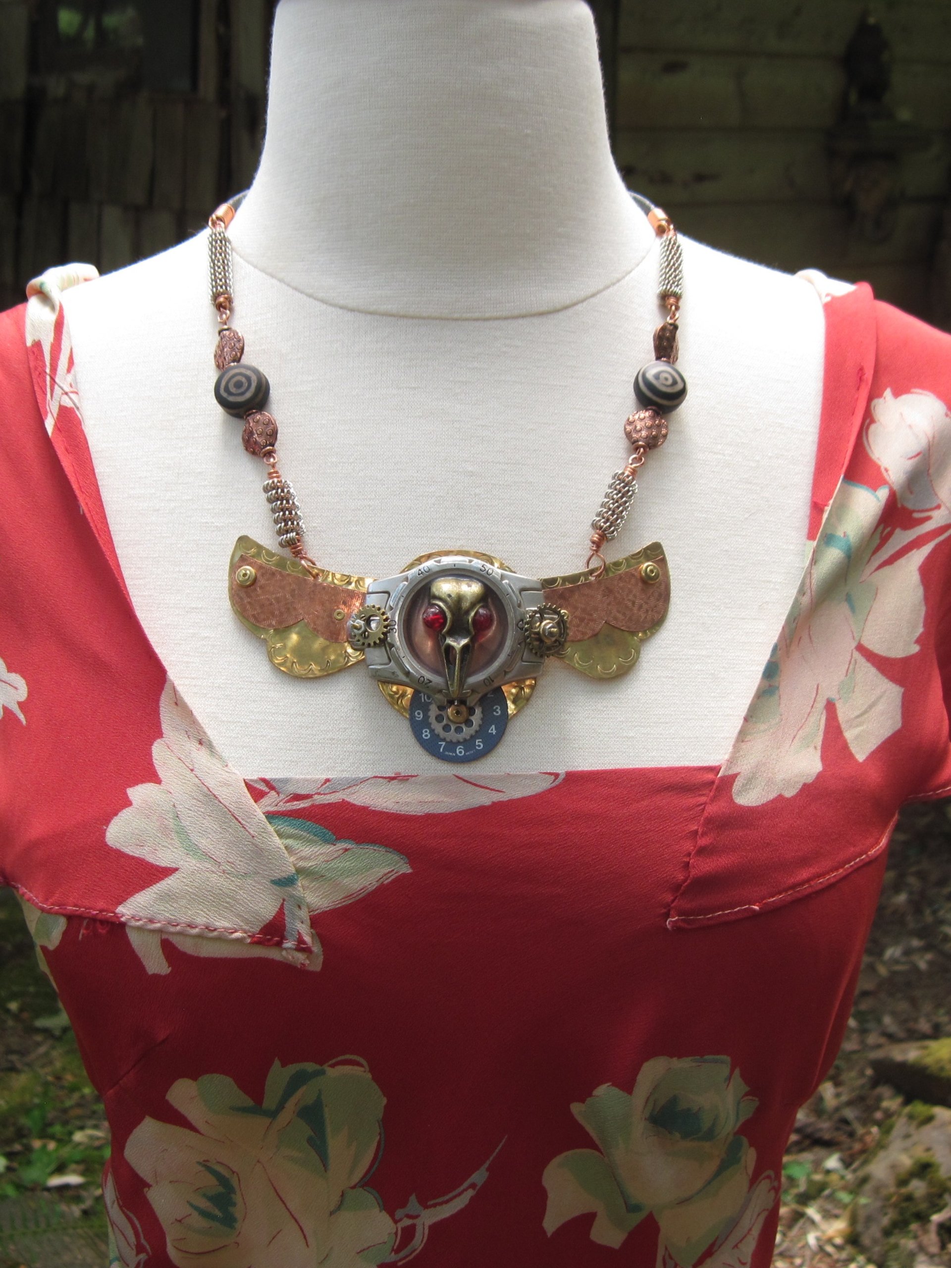 Steampunk  statement  repurposed breastplate winged watch parts