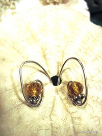 Gold crystal bead and sterling silver hoop style earring