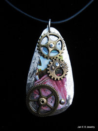 Steampunk gears and recycled vintage tin pendant