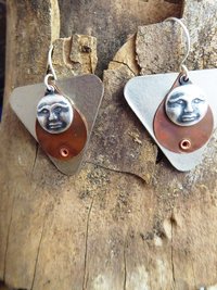 Mixed metal moon face dangle earrings copper and German silver