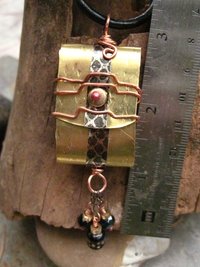 Brass and recycled tin Tibetan Prayer Package Word pendant stamped Being