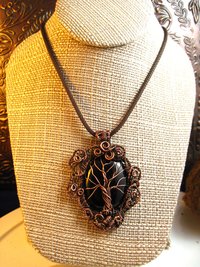 Copper black onyx tree of life with a swirling spirals wire woven pendant one of