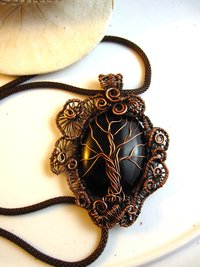 Copper black onyx tree of life with a swirling spirals wire woven pendant one of