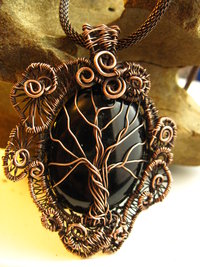 Copper black onyx tree of life with a swirling spirals wire woven pendant one of