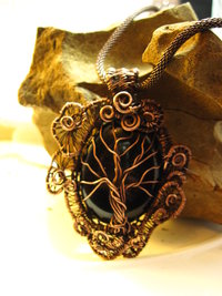 Copper black onyx tree of life with a swirling spirals wire woven pendant one of