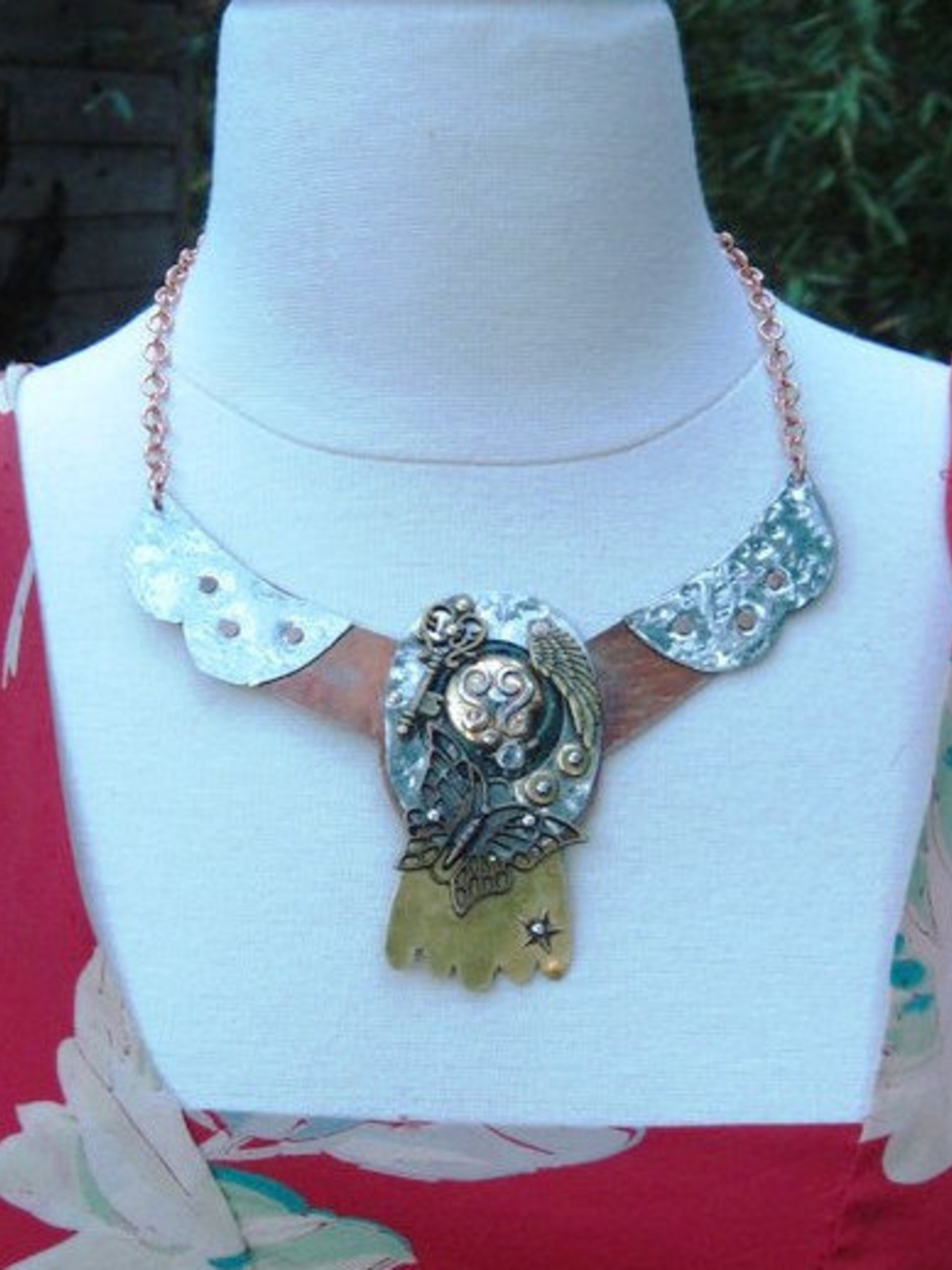 mixed metal art neck piece