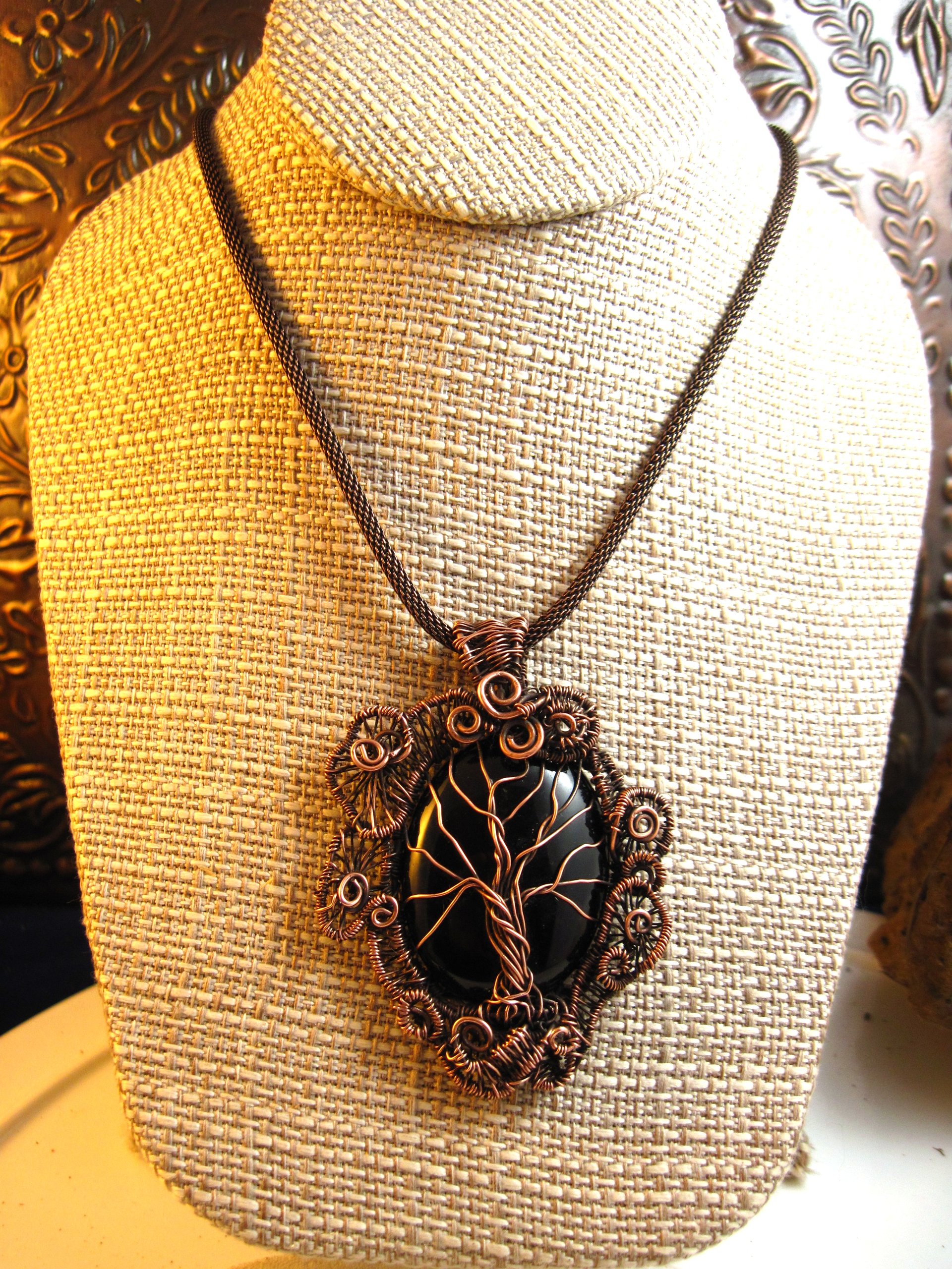 Copper black onyx tree of life with a swirling spirals wire woven pendant one of