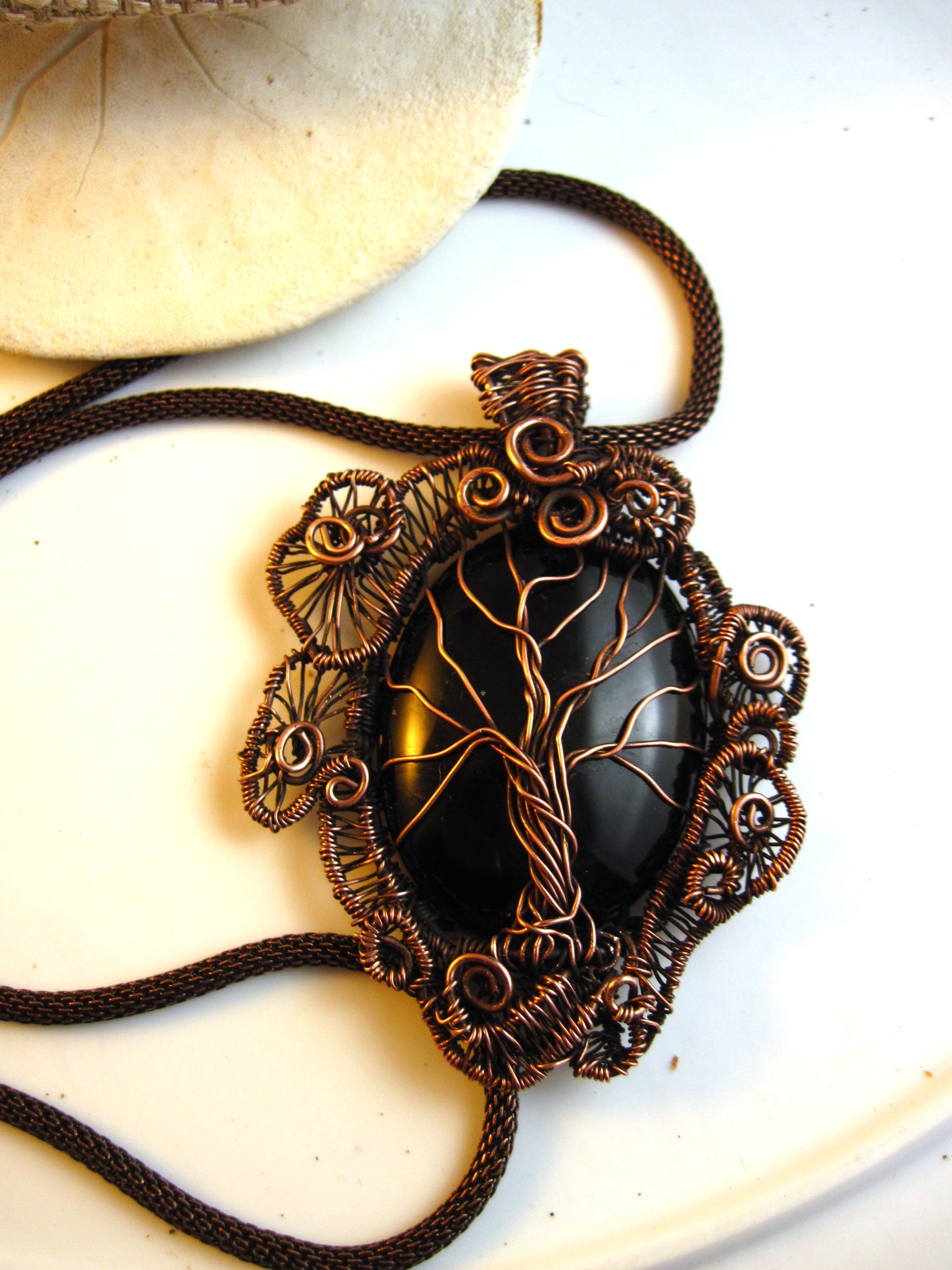 Copper black onyx tree of life with a swirling spirals wire woven pendant one of