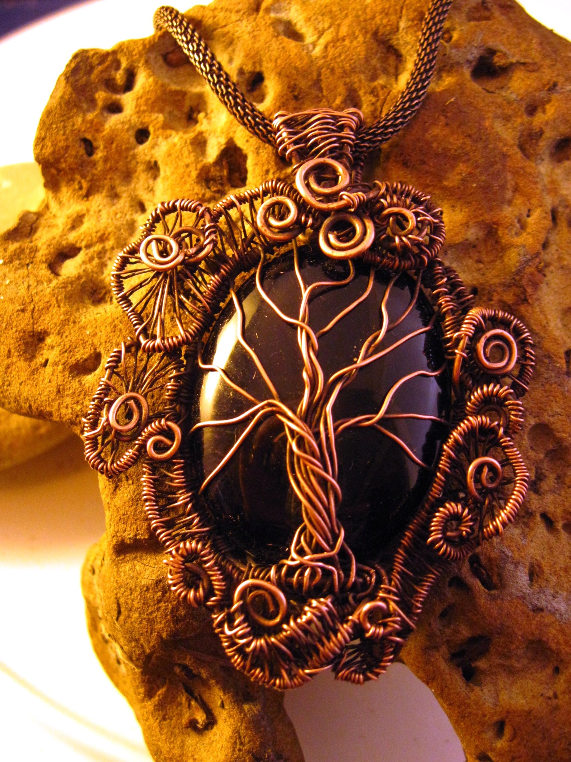 Copper black onyx tree of life with a swirling spirals wire woven pendant one of