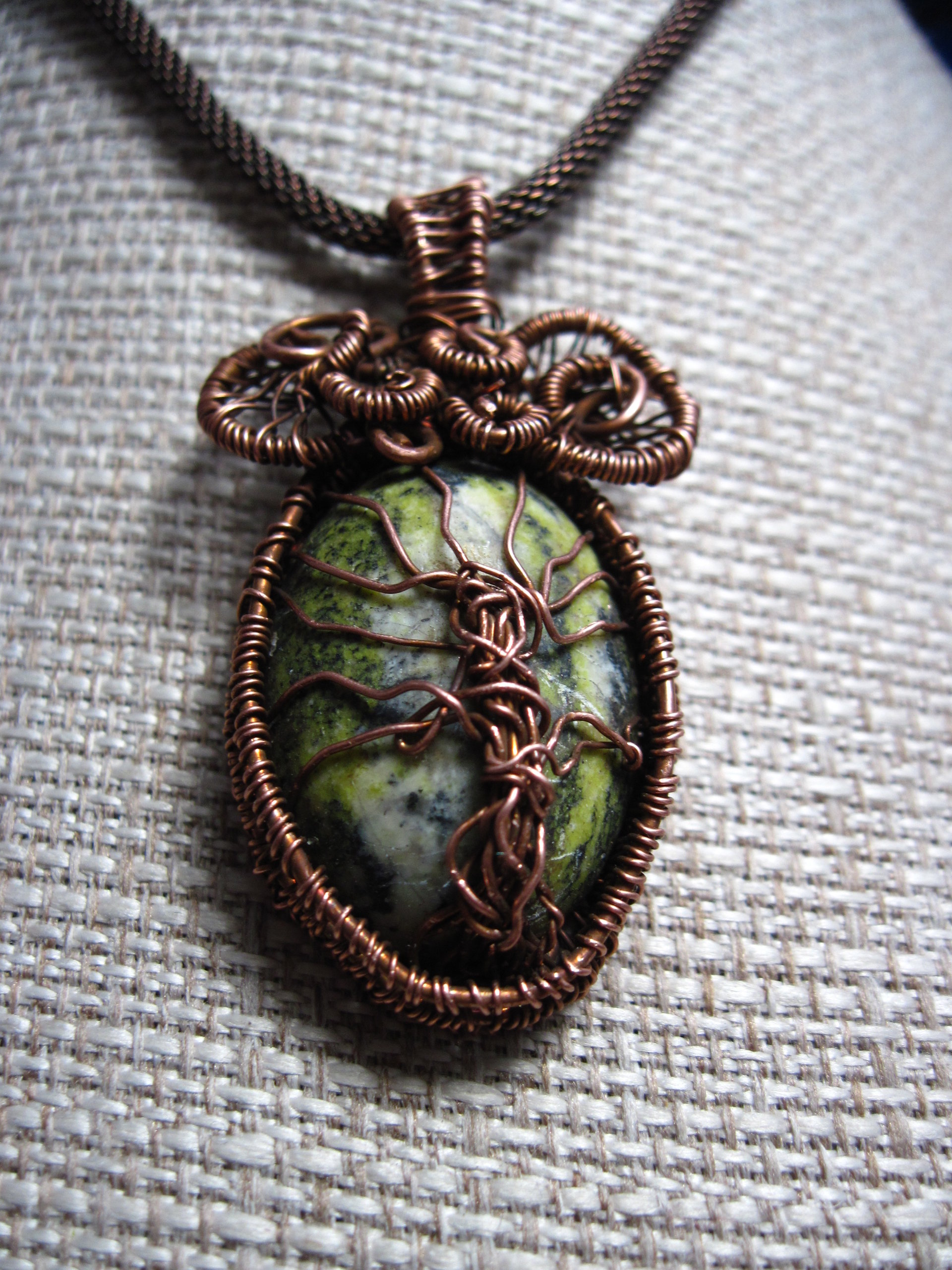 Copper wire woven tree of life stone pendant