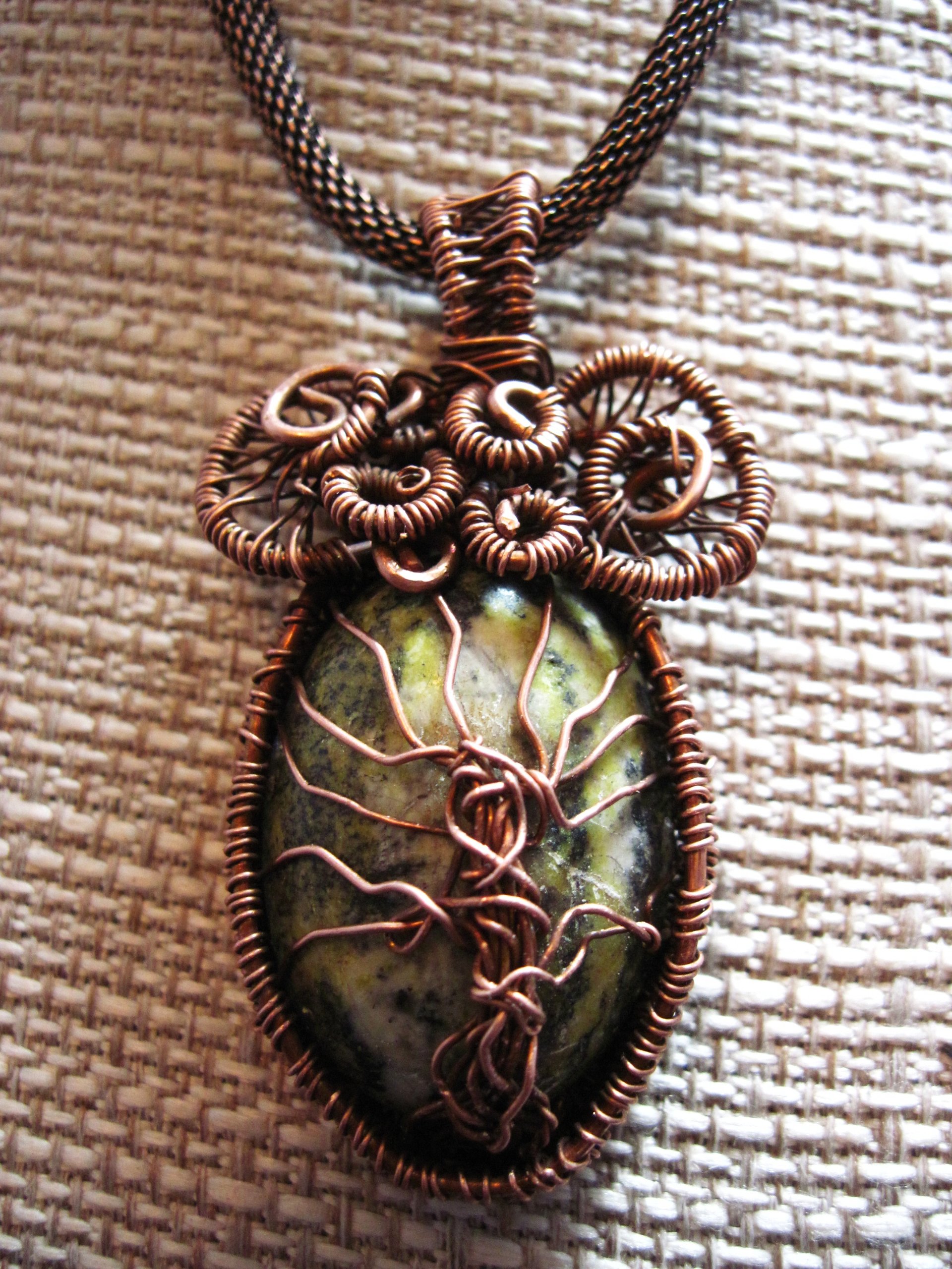 Copper wire woven tree of life stone pendant