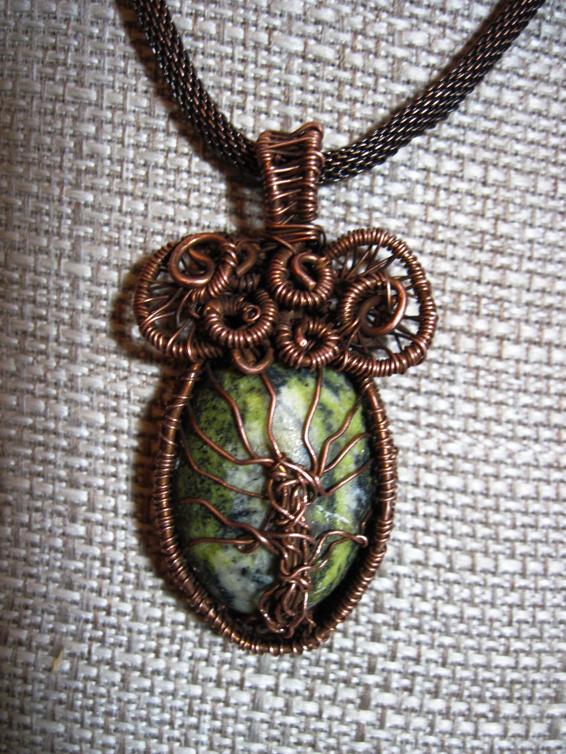 Copper wire woven tree of life stone pendant